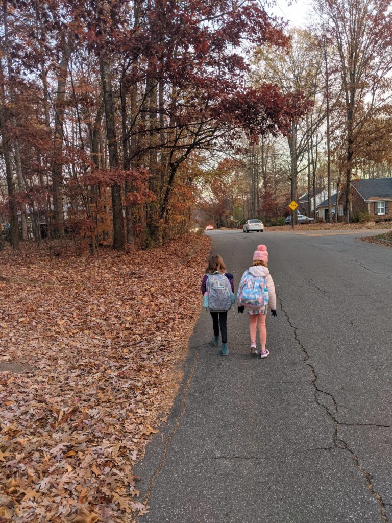 Rosie and Sydney walking to school