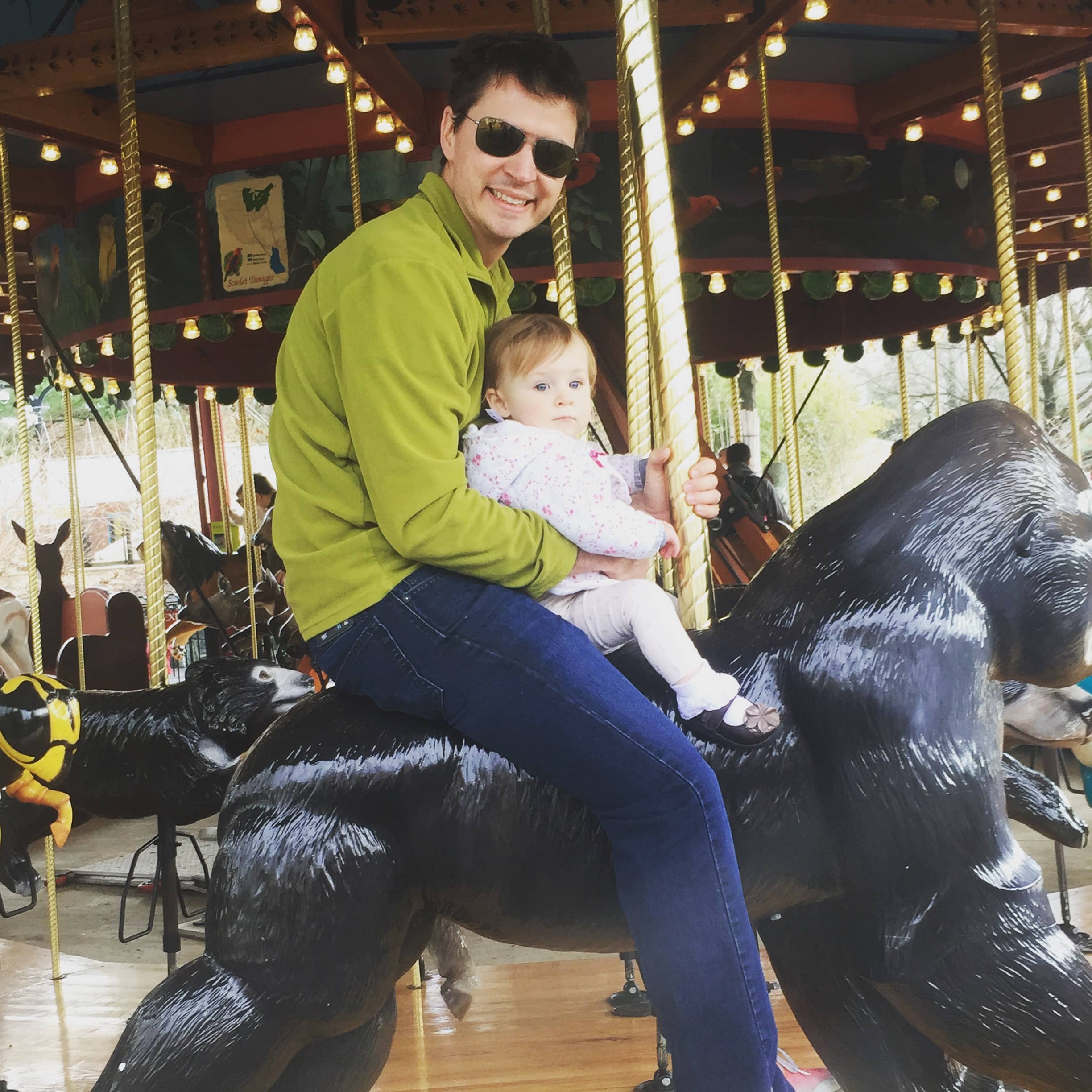 Rosie as a baby on the carousel