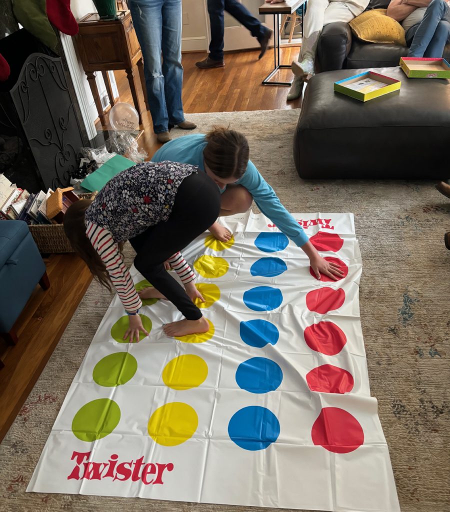 Rosie got twister for her Birthday, and played with cousin Lila