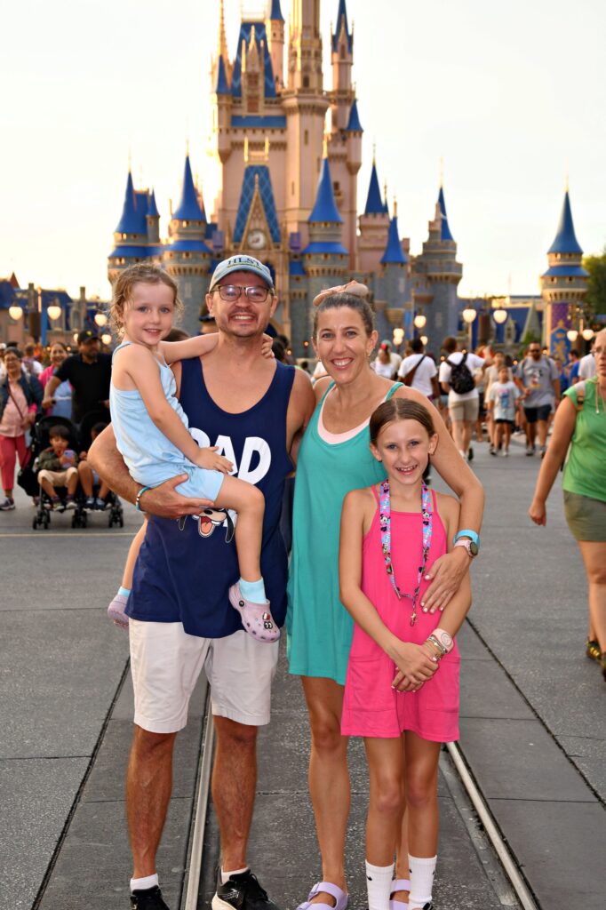 The family in front of Cinderellas castle